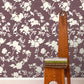 Image of Camellia Bloom in Maroon Wallpaper