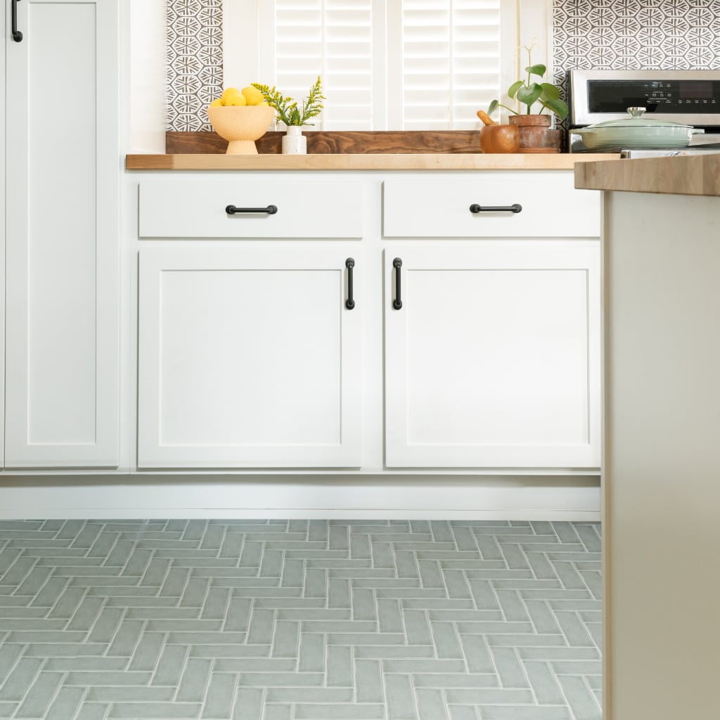 Kitchen decorated with Dark Grey Herringbone Tile Decals